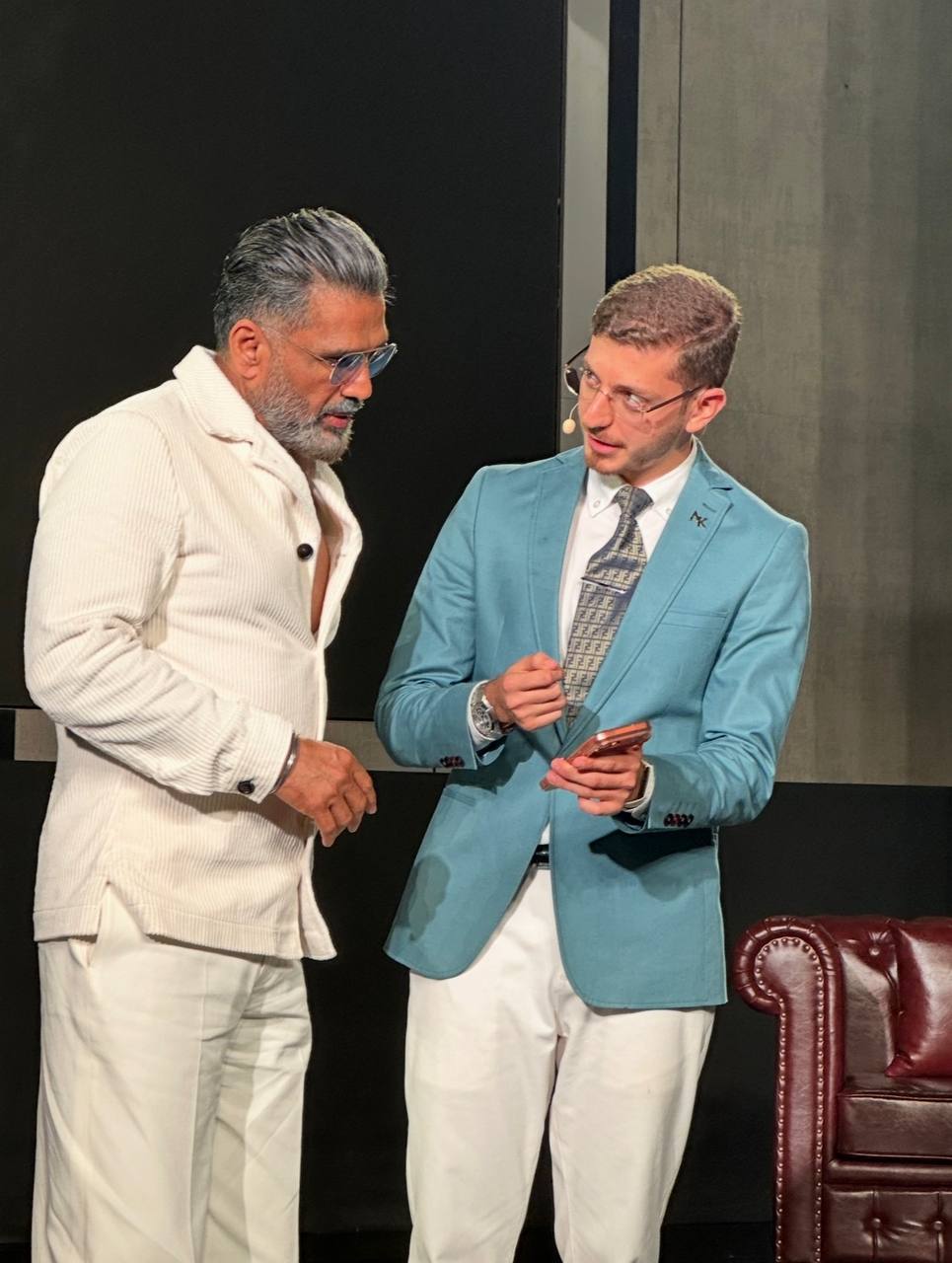 Amir Hossein Kazemkhani with Suniel Shetty on the Falcons of Majlis Chesterfield set